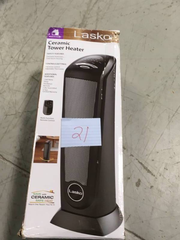 lot 21 image: Lasko Ceramic Tower Heater with Remote Control in good condition