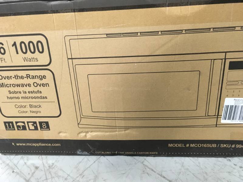 lot 23 image: Magic Chef 1.6 cu. ft. Over the Range Microwave in Black in like new condition