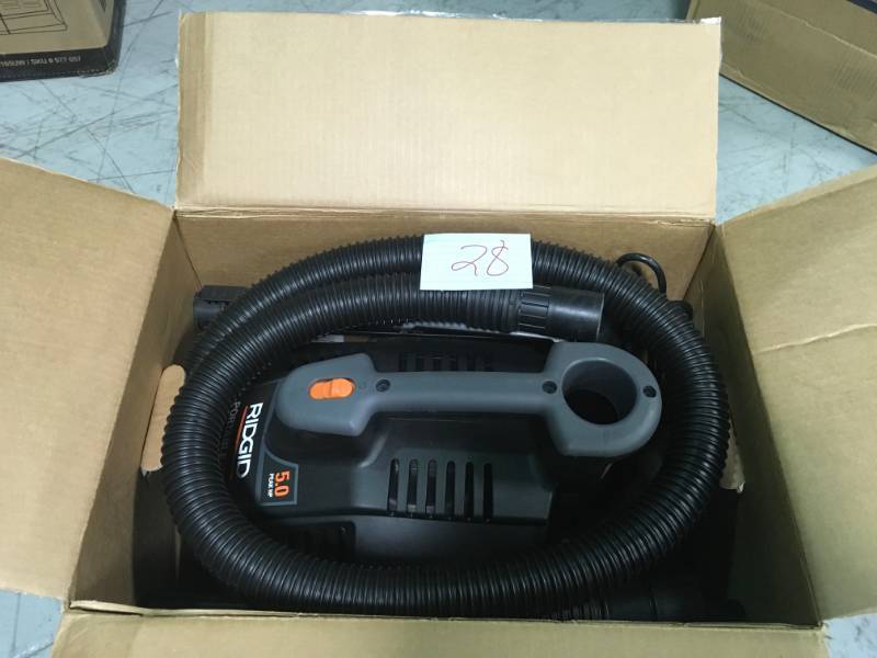 lot 28 image: RIDGID 4 Gal. 5.0-Peak HP Portable WetDry Vacuum USED in good condition