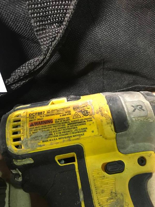 lot 34 image: DEWALT DCF887D2 20V MAX XR Li-ion 2.0 Ah Brushless 0.25 3-Speed Impact Driver USED in good condition