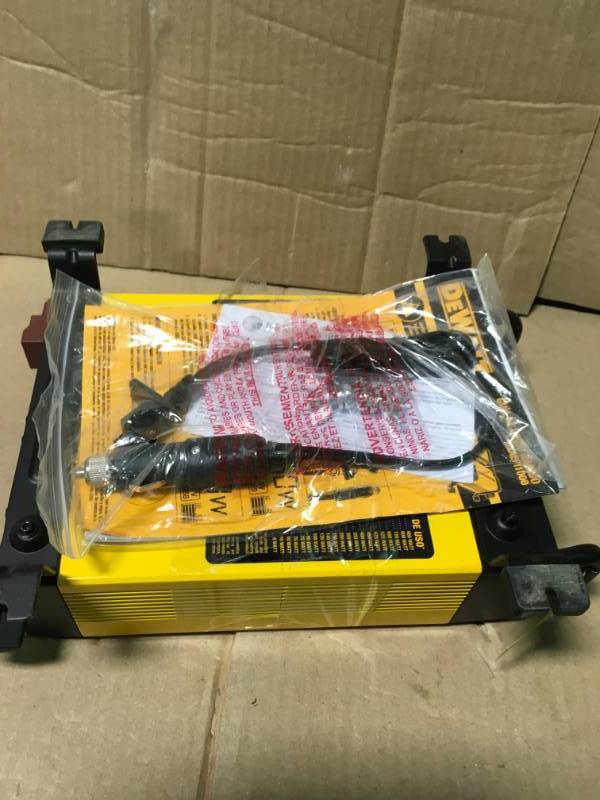 lot 83 image: DEWALT 1000-Watt Power Inverter USED in good condition