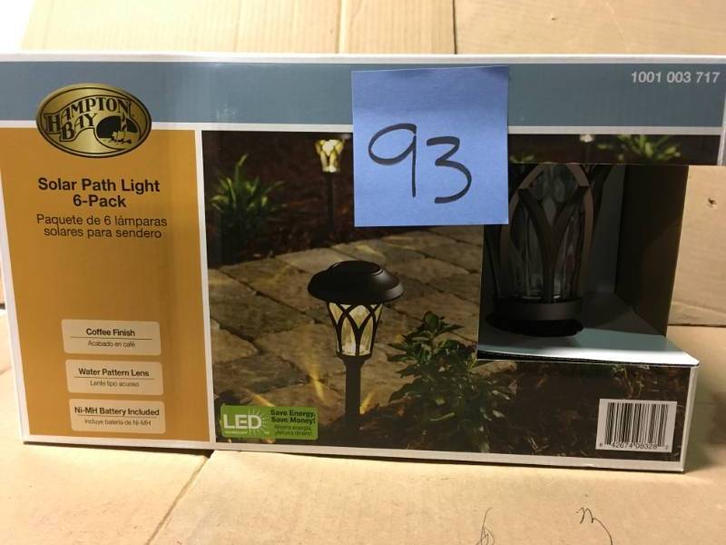 lot 93 image: Hampton Bay Solar Bronze Outdoor Integrated LED Landscape Fan Cage Path Light with Water Glass Lens (6-Pack) not used