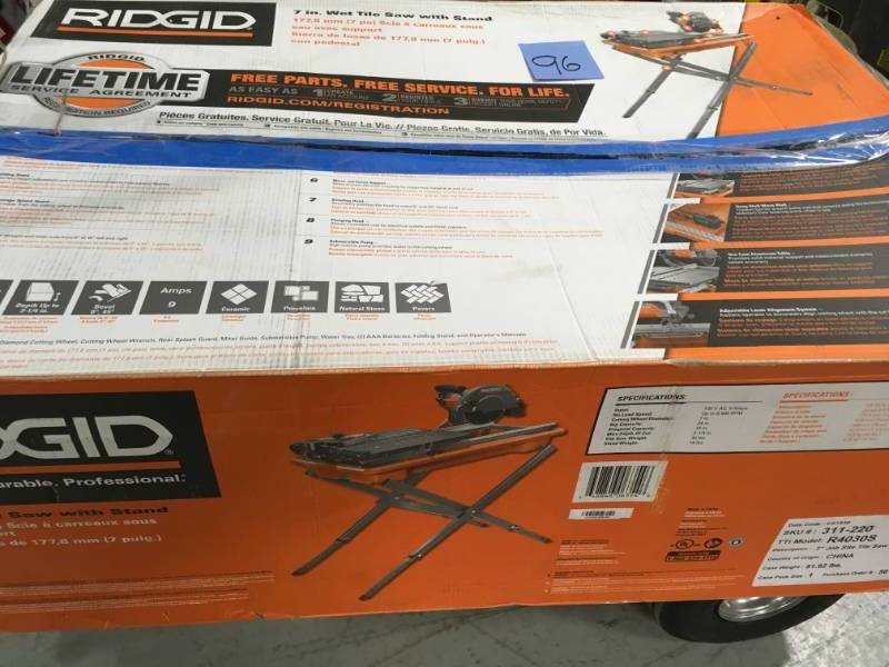 lot 96 image: RIDGID 7 in. Tile Saw with Stand in like new condition