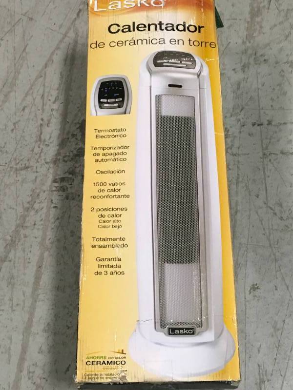 Lasko 23 in. 1500-Watt Digital Oscillating Ceramic Tower Heater - White not used