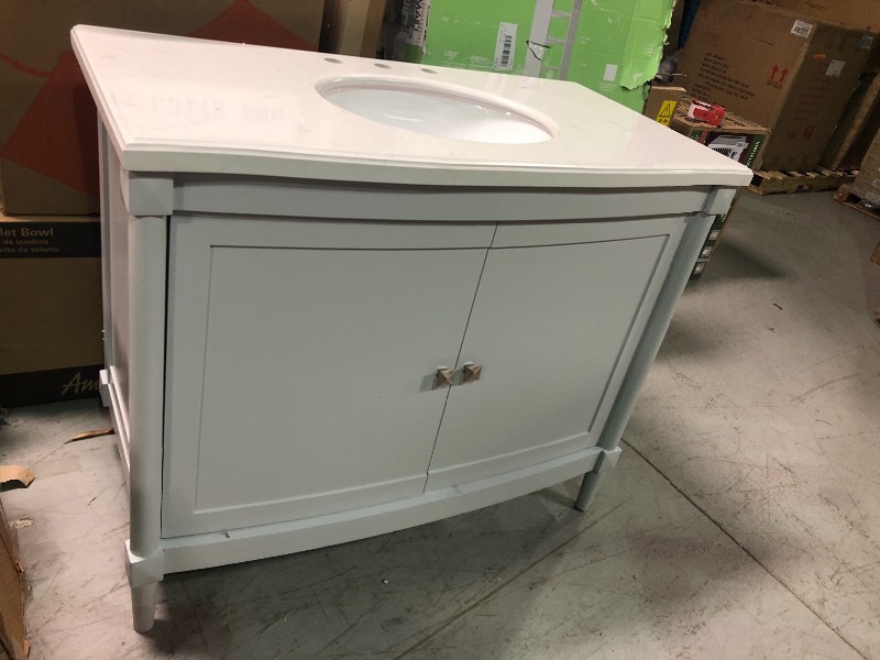 Home Decorators Collection Parkcrest 42 in. W x 22 in. D Bath vanity in Dove Grey with Marble Vanity Top in White with White Basin not used whit missing one leg