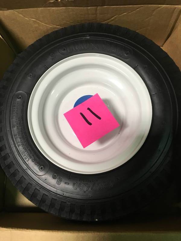 lot 11 image: Martin Wheel 480400-8 LRB Tire and Wheel with 1 in. Bearing for Log SplitterTrailer not used