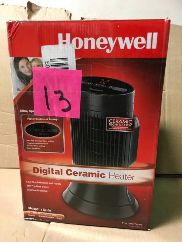 lot 13 image: Honeywell 13 in. 1,500-Watt Compact Ceramic Tower Personal Heater with Digital Controls in like new condition