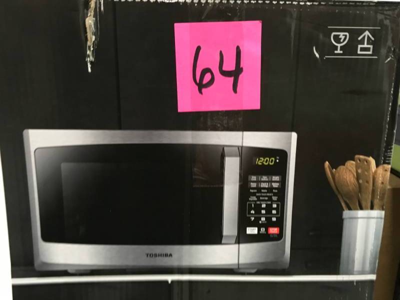 lot 64 image: Toshiba 0.9 cu. ft. Stainless Steel Countertop Microwave Oven not used