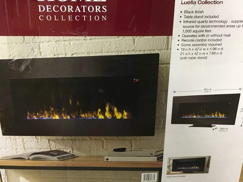 lot 90 image: Home Decorators Collection 42 in. Infrared Wall Mount Electric Fireplace not used