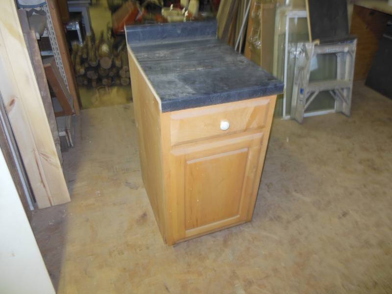 lot 35 image: 18 base cabinet with top, used for...