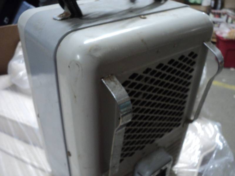 lot 10 image: Titan Heater...