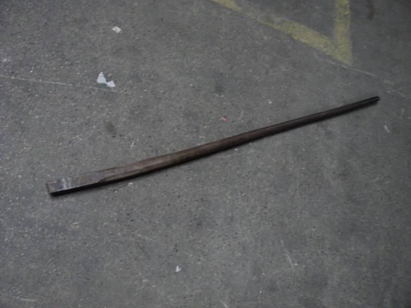lot 20 image: heavy cast iron Chisel 57 long...