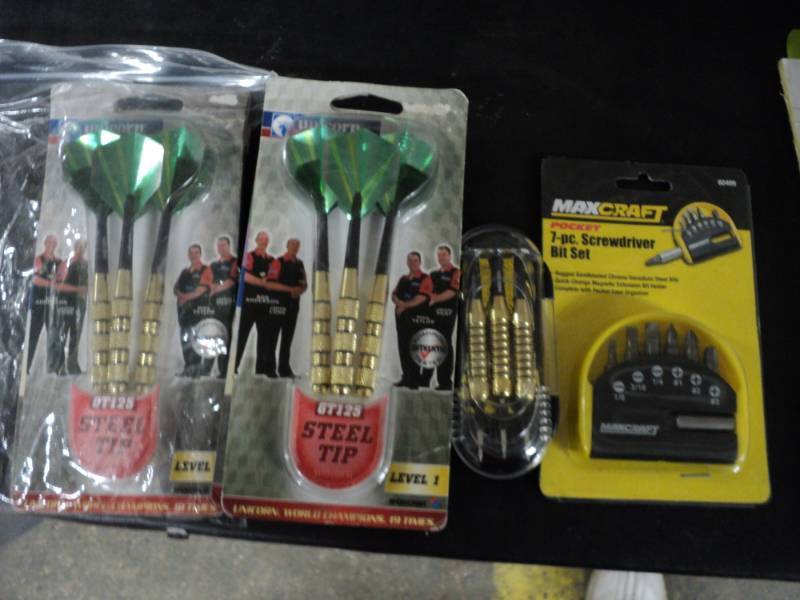 lot 34 image: Unicorn steel tip darts and 7 pc sc...