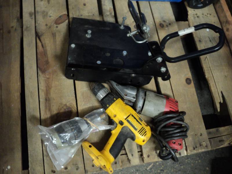 lot 52 image: Mount, Milwaukee, and DeWalt tools...