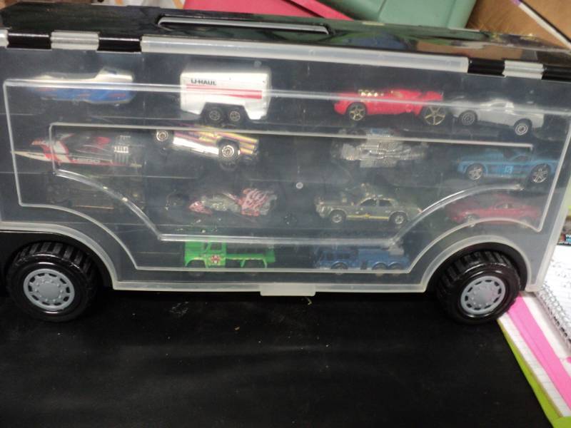 lot 73 image: Trunk with match box vehicles...