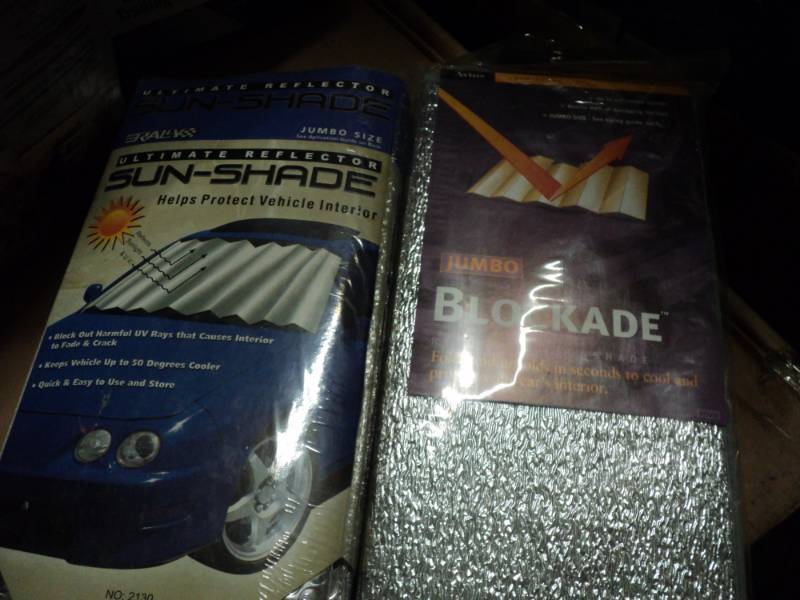 lot 79 image: Sun shade and Block ade...