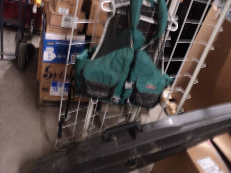 lot 100 image: Empty case and life vest...