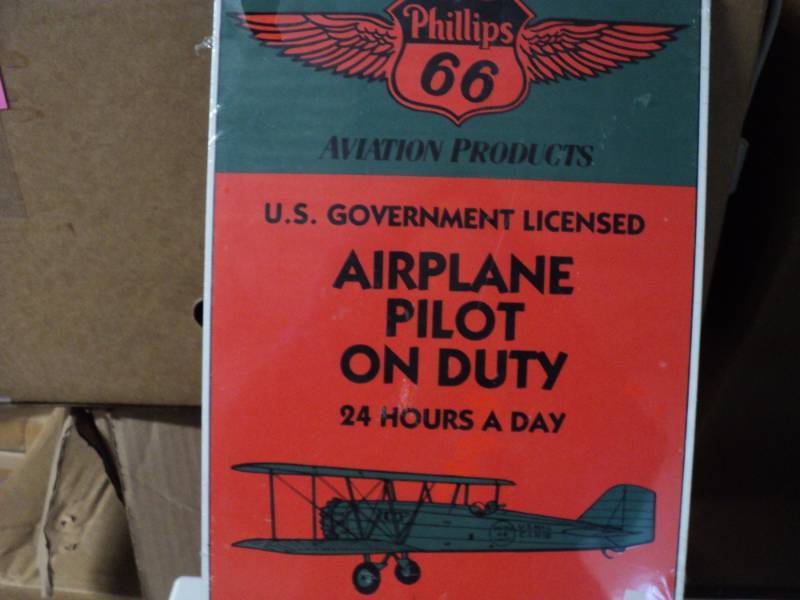 lot 155 image: Phillips 66 airplane metal sign 9 ...