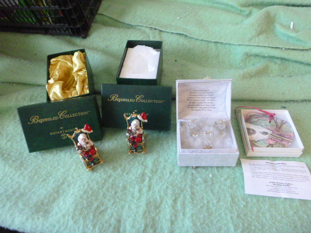 lot 12 image: 2 Bejeweled Collection Santa in Rocking Chair
