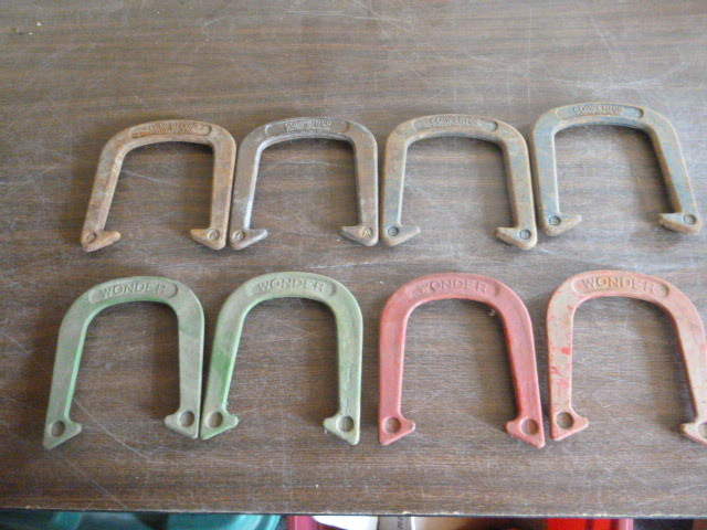 lot 32 image: 2 Sets of Four Pitching Horse Shoes