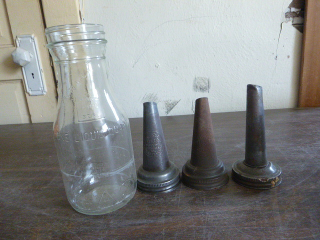 lot 34 image: Vintage Automotive Oil Bottle and Three Spouts