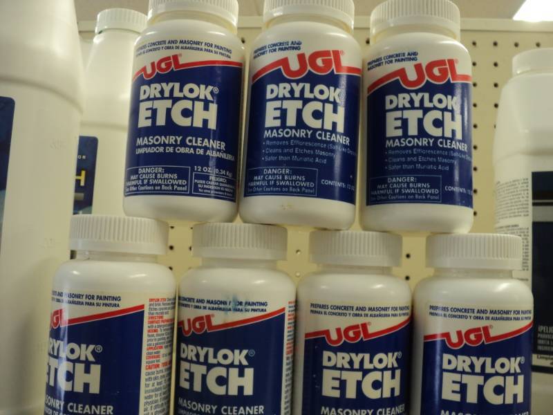 lot 12 image: 7 bottles of Drylok Etch Masonry Cl...