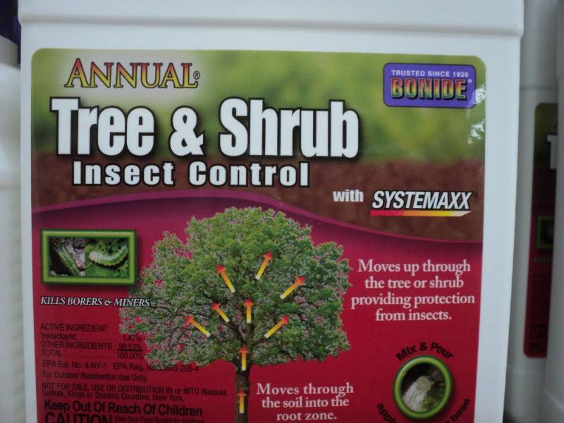 lot 379 image: 4 bottles of Annual Tree Shrub Inse...