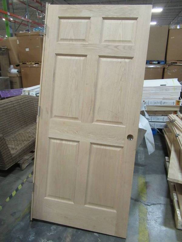 lot 13 image: ReliaBilt Unfinished 6-Panel Solid Wood Oak Single Slab (Common 36-in X 80-in) - Scratch and Dent.
