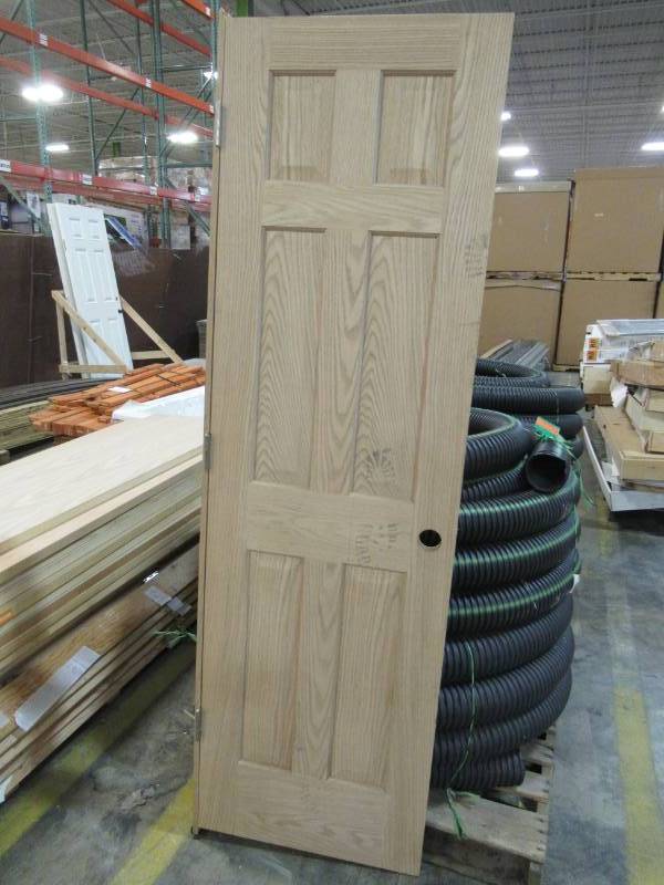 lot 30 image: ReliaBilt Unfinished 6-Panel Solid Wood Oak Single Slab (Common 24-in X 80-in) - Scratch and Dent