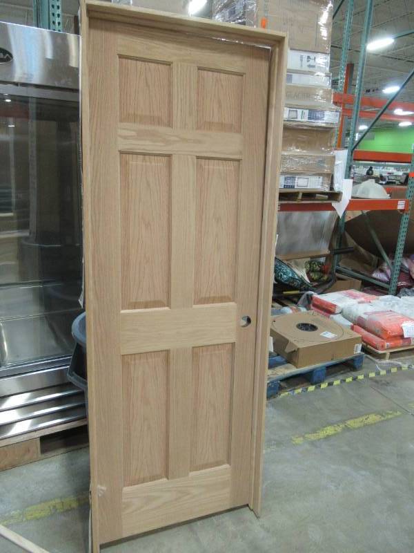 lot 44 image: Reliabilt Unfinshed 6 Panel Oak Solid Wood Door, 28, Left Handed, 687700.