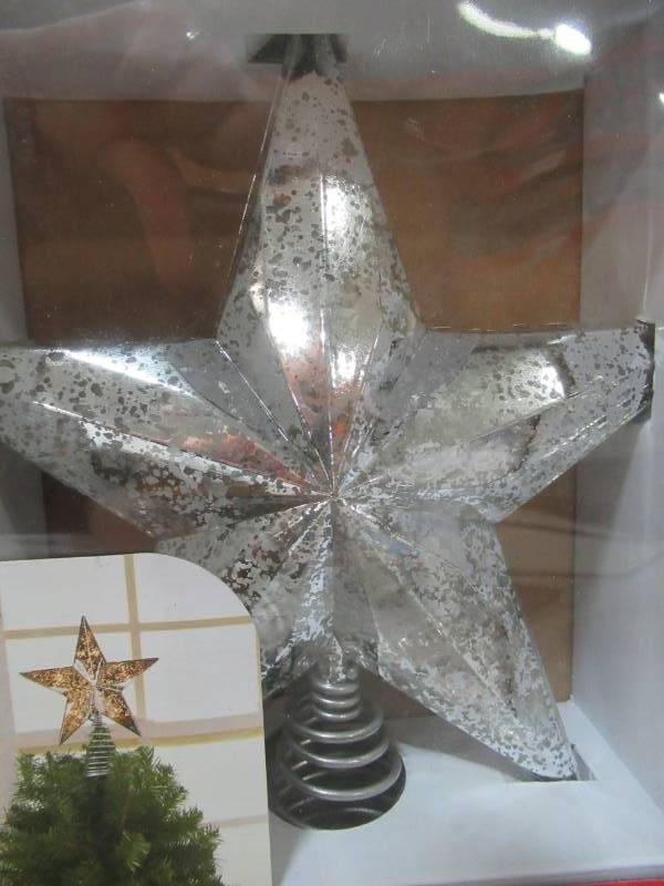 lot 75 image: Home Accents Holiday 8.5 in. Silver Mercury Tree Topper, Model 49057-56