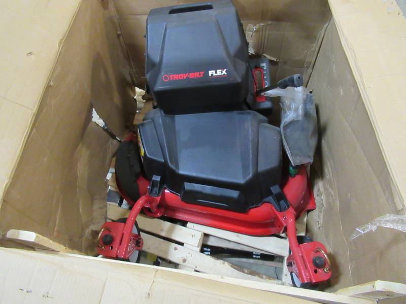 lot 87 image: Troy-Bilt FLEX 28-in Lawn Mower Base Attachment with Mulching Kit 23AAAA8X711 - SLIGHTLY USED