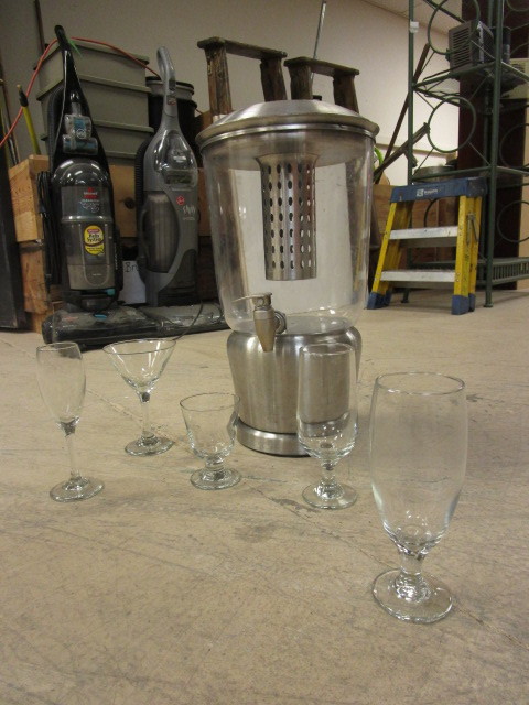 BEVERAGE DISPENSER AND NEW GLASSWARE