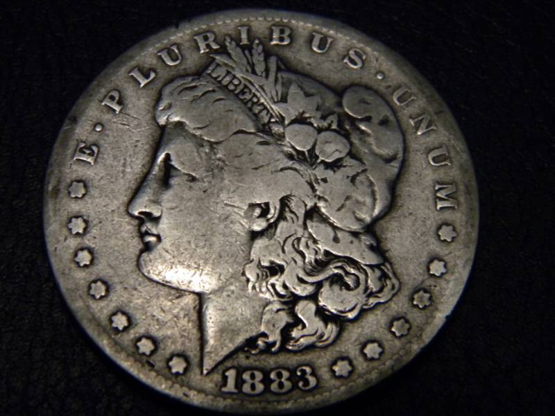 lot 12 image: 1883 S Morgan Silver Dollar