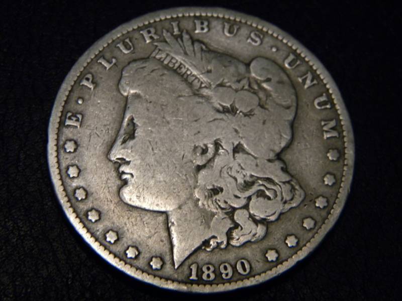 lot 23 image: 1890 O Morgan Silver Dollar