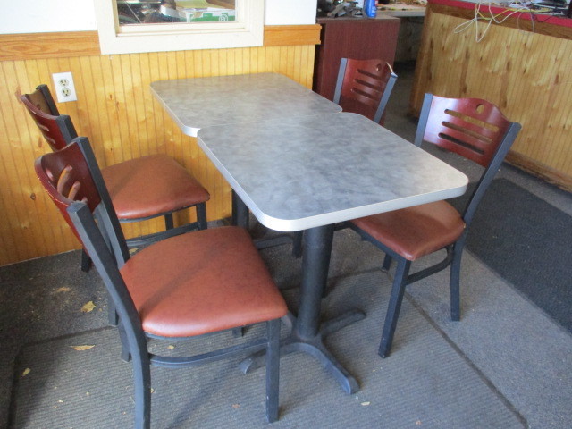 lot 24 image: (2) Bistro Style 2 Seat Restaurant Tables with (2) Chairs. Nice Shape used at food establishment over summer, strong chairs and tables.