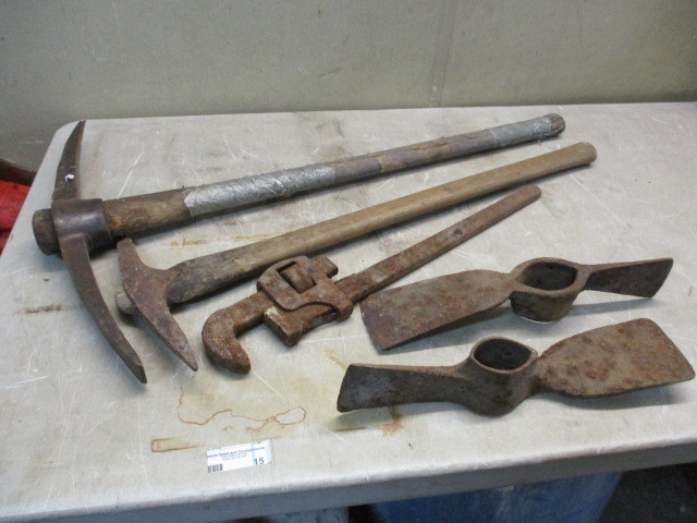 lot 15 image: Antique Pick axes and wrench