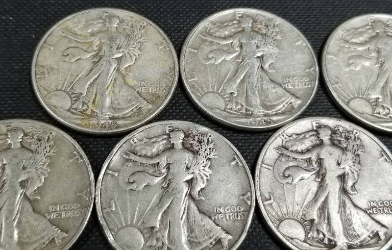 7 WALKING LIBERTY SILVER HALF DOLLARS AS PICTURED