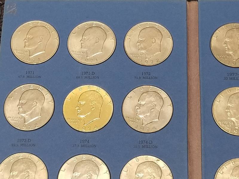 BOOK OF US EISENHOWER DOLLARS 26 COINS AS PICTURED