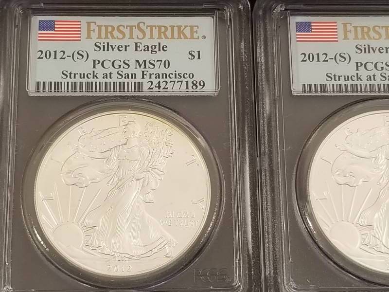 GROUP OF 4 PERFECT PCGS MS70 FIRST STRIKE AMERICAN SILVER EAGLES AS PICTURED
