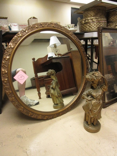 lot 827 image: LARGE, ROUND ORNATE MIRROR  STATUE