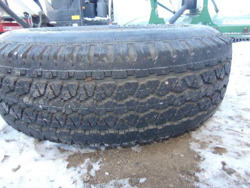 lot 32 image: Goodyear Wrangler Tire and Rim