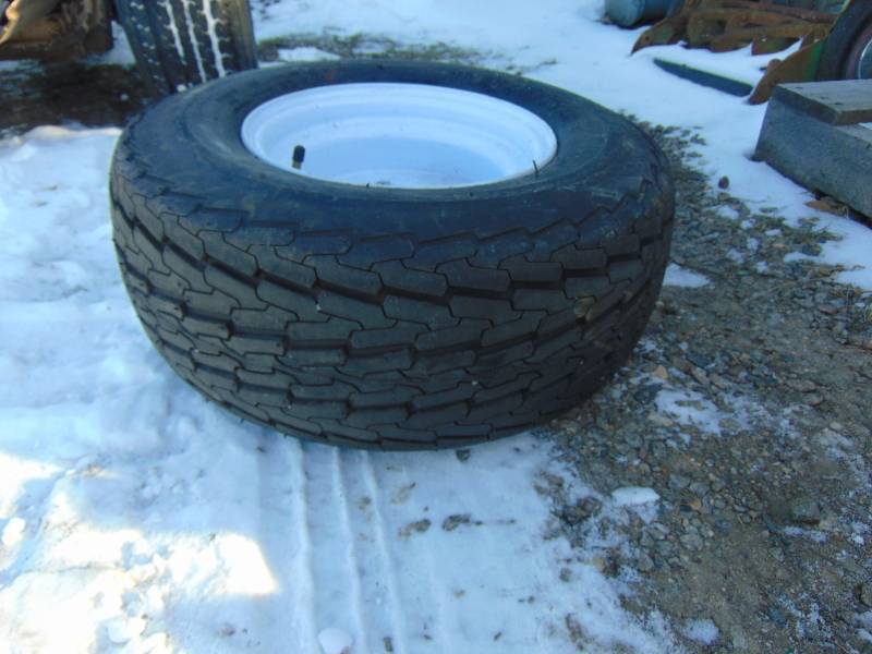 lot 36 image: (1) 20.5 x 8-10 Tire and Rim