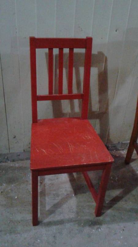 lot 9 image: Two Chairs, Red One Is Ikea, Shows Some Wear, Wood One Is Antique, Has Broke Joint In Leg