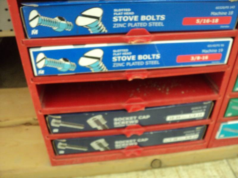 Display box filled with stove bolts...