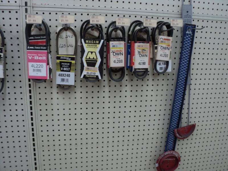 lot of v belts and 2 belt sizers...