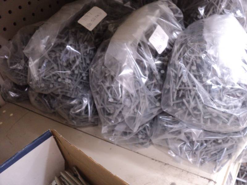 9 � 3 pound bags of 5D nails...