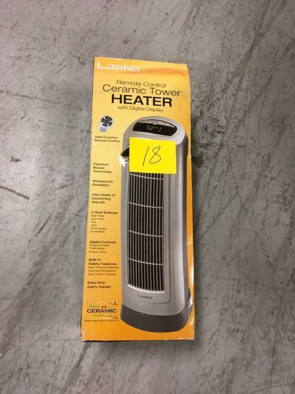 Lasko 23 in. 1500-Watt Ceramic Tower Heater with Digital Display and Remote Control open box not used
