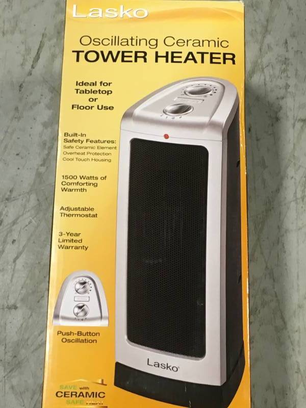 Lasko 16 in. 1500-Watt Oscillating Ceramic Tower Heater with Manual Control open box not used