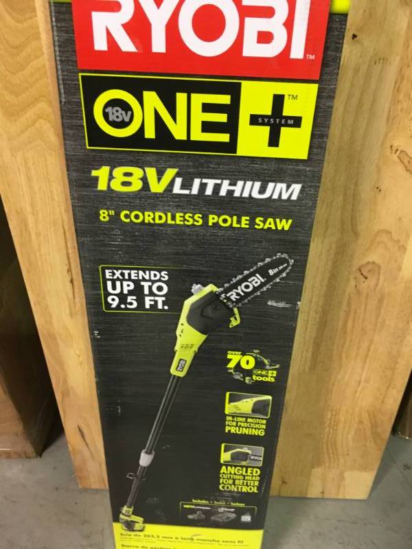 lot 9 image: Ryobi ONE 8 in. 18-Volt Lithium-Ion Cordless Pole Saw 1.3 Ah Battery and Charger Included  open box in like new condition